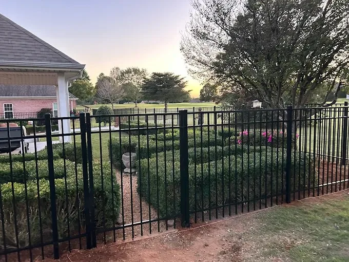Ornamental metal fence panels with flat-top pickets